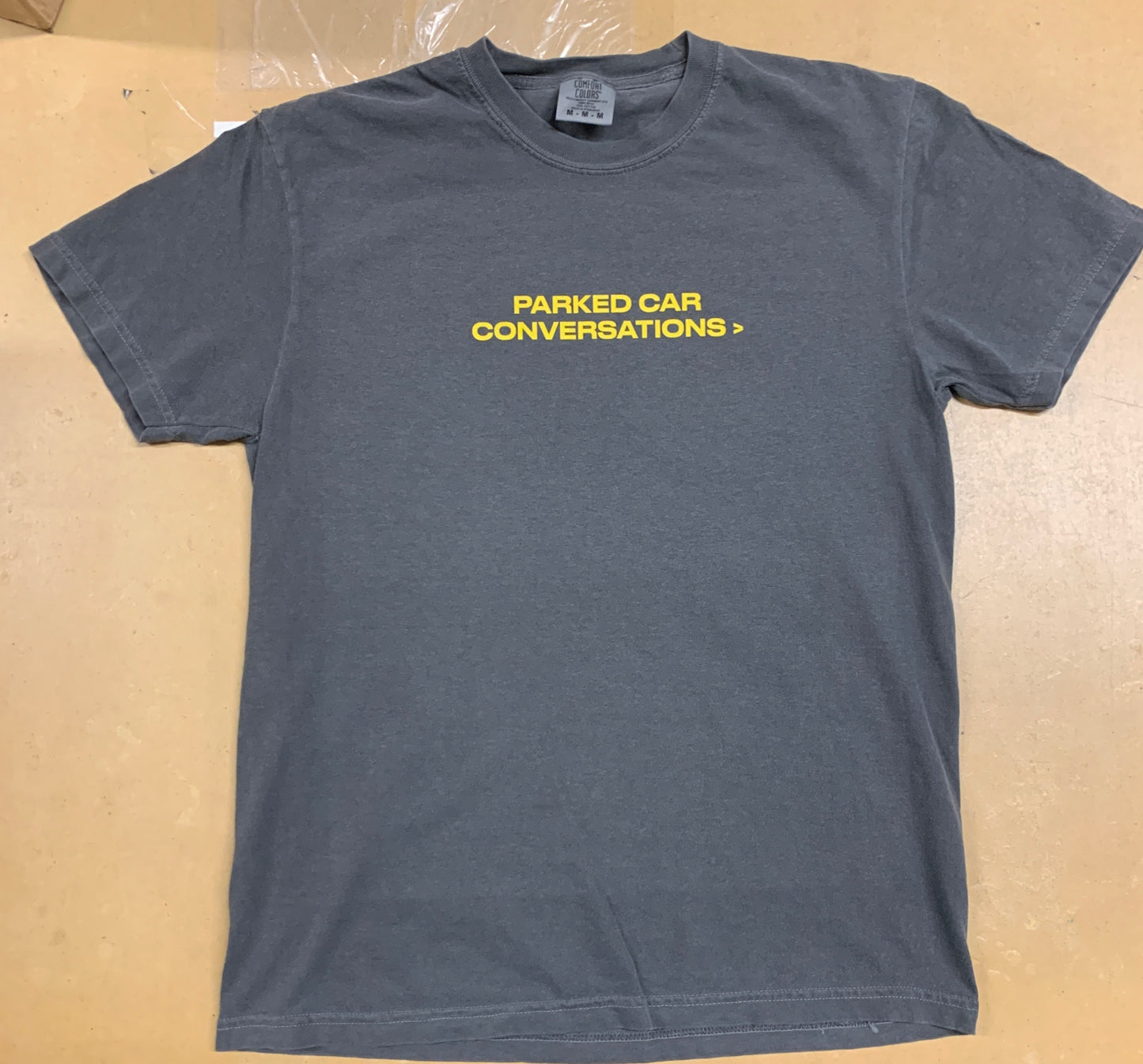 femdot. "Parked Car Conversations" 94CM Anniversary tee.